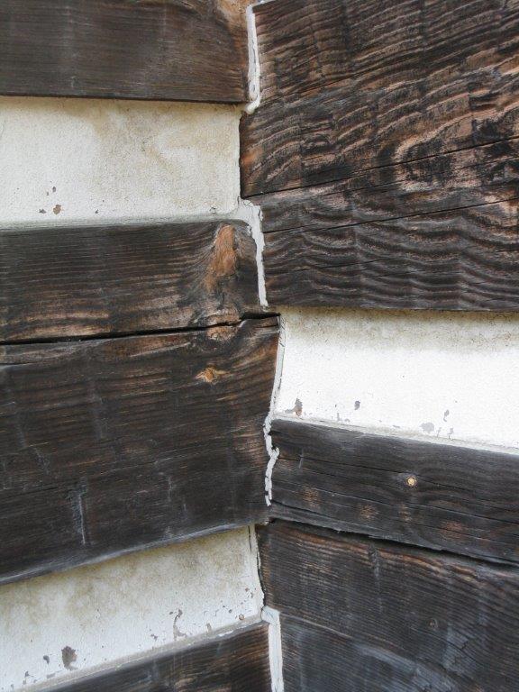Home wooden wall needing repair